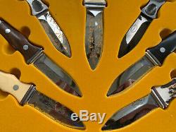 1977 A. G. Russell Knives Store Display Case With 7 Boot Double Edged Sting Knives