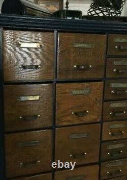 Antique Hardware Store Rotating Nut and Bolt cabinet