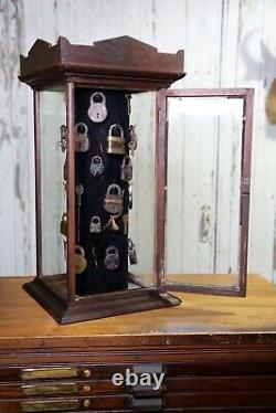 Antique store counter display case rotating cabinet glass wood hardware vintage