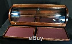 Curved glass display case African Mahogany with 2 removable trays plus storage