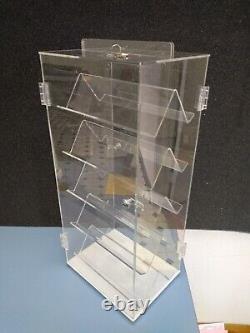 Rotating display case, two sided with shelves, locking doors keys & sign holder