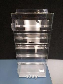 Rotating display case, two sided with shelves, locking doors keys & sign holder