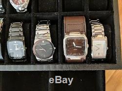 Set of Fossil Watches + Display Case. All in great condition and kept in storage