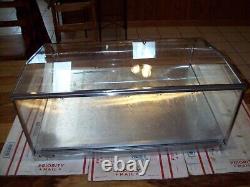 Stainless Steel Store Display Case Has Curved Front Glass