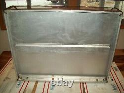 Stainless Steel Store Display Case Has Curved Front Glass